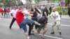 Poland - Polish and Russian soccer fans clash outside the National Stadium in Warsaw, 12Jun2012